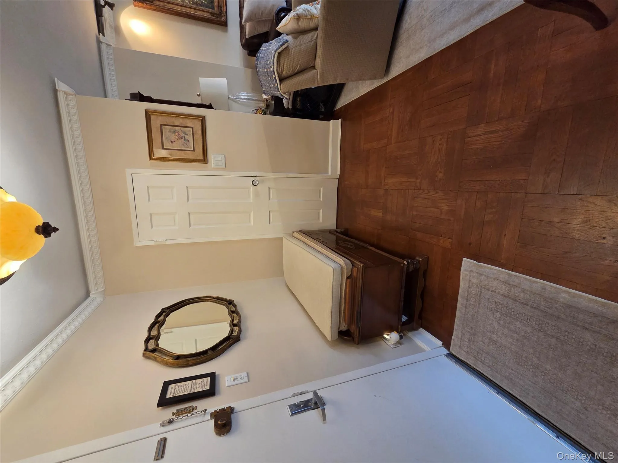 Hall featuring ornamental molding and parquet floors Hall featuring ornamental molding and parquet floors