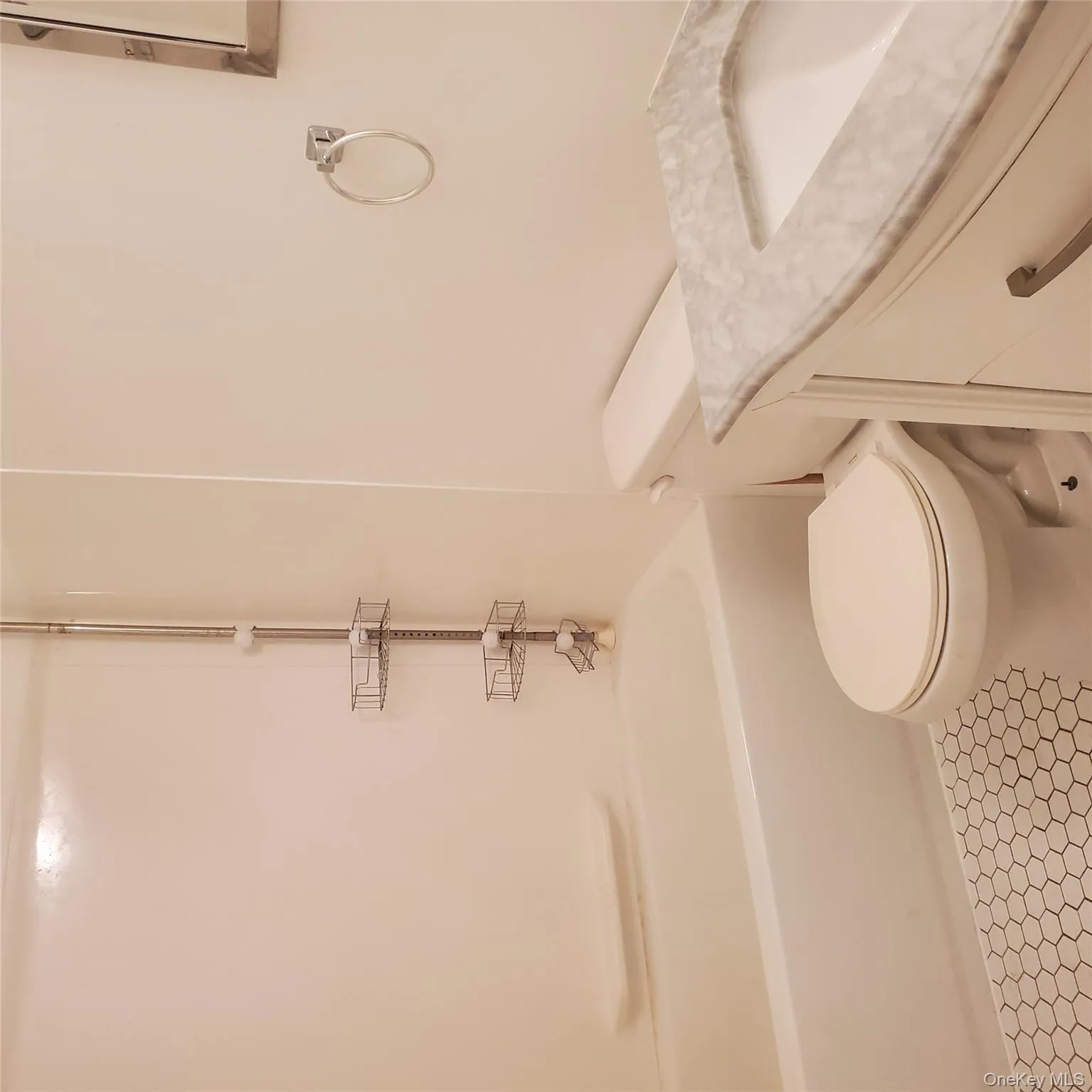 Bathroom with vanity, shower / tub combination, and tile patterned flooring Bathroom with vanity, shower / tub combination, and tile patterned flooring