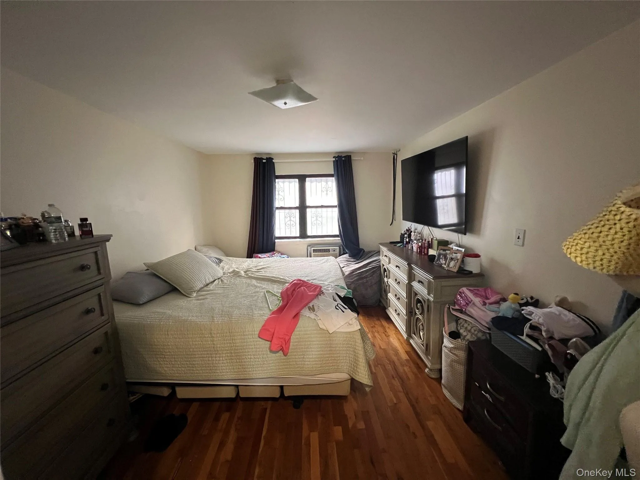 Bedroom with dark wood-type flooring Bedroom with dark wood-type flooring