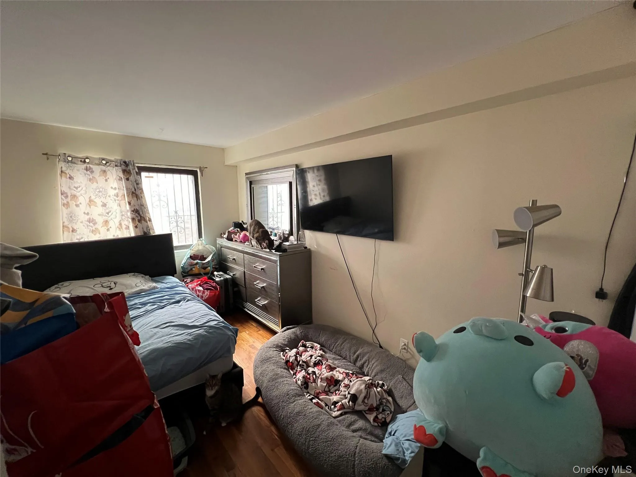 Bedroom with wood finished floors Bedroom with wood finished floors