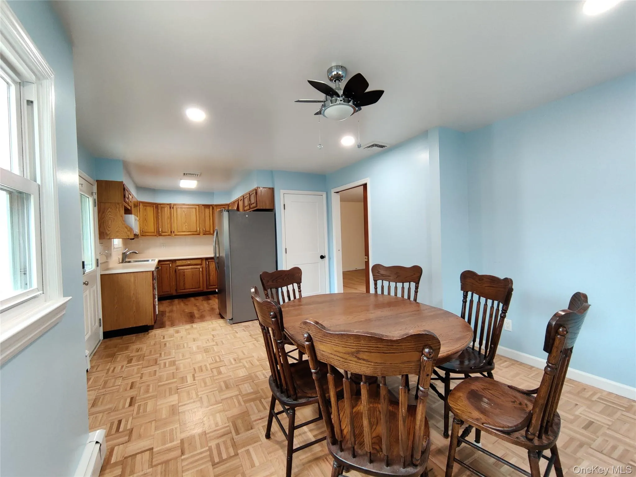 Dining room with ceiling fan and recessed lighting Dining room with ceiling fan and recessed lighting