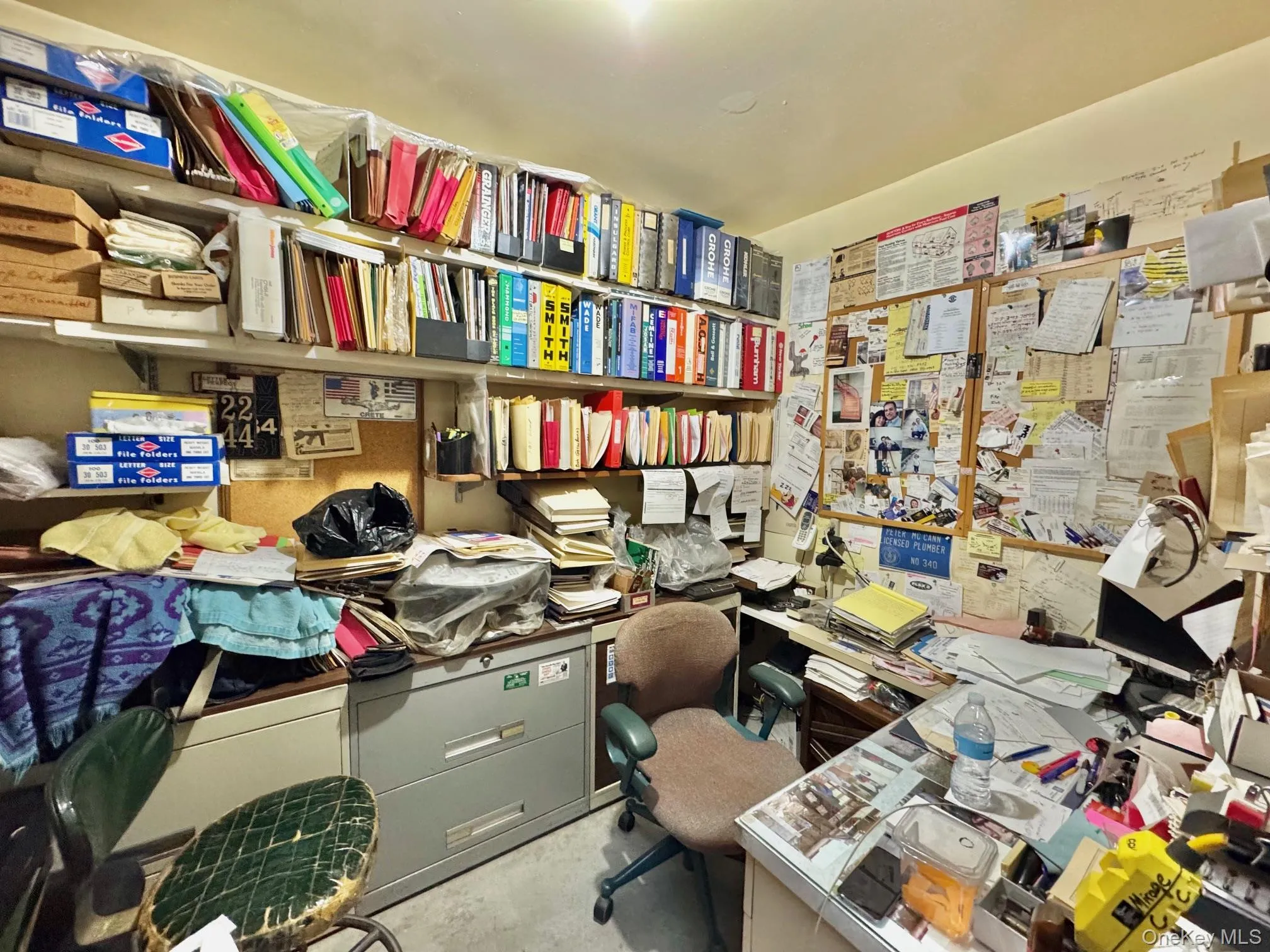 Office featuring concrete floors Office featuring concrete floors