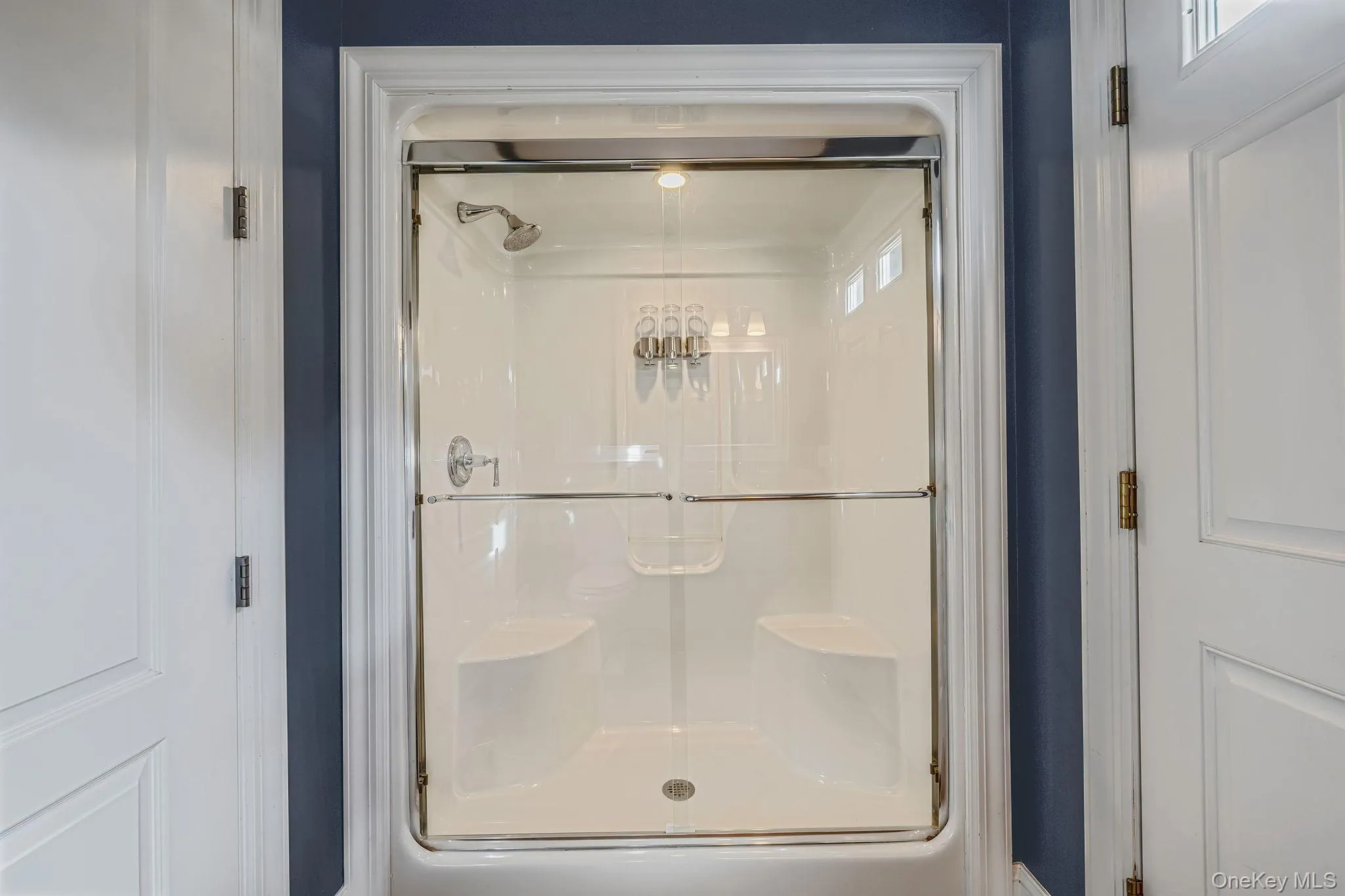 Full bathroom with a stall shower Full bathroom with a stall shower