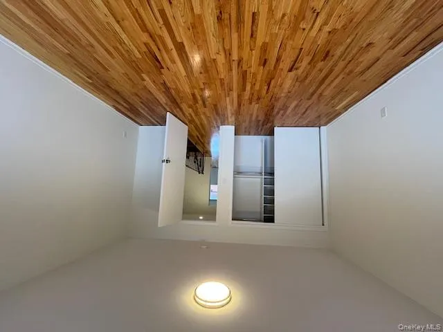 Unfurnished bedroom with light wood-type flooring and a closet Unfurnished bedroom with light wood-type flooring and a closet