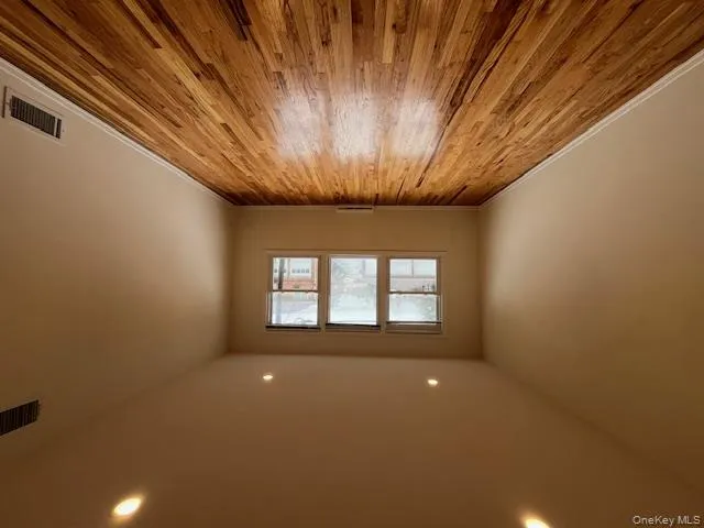 Unfurnished room featuring light wood finished floors and recessed lighting Unfurnished room featuring light wood finished floors and recessed lighting