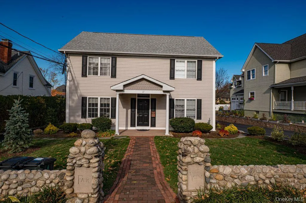 View of front of house with a front lawn View of front of house with a front lawn