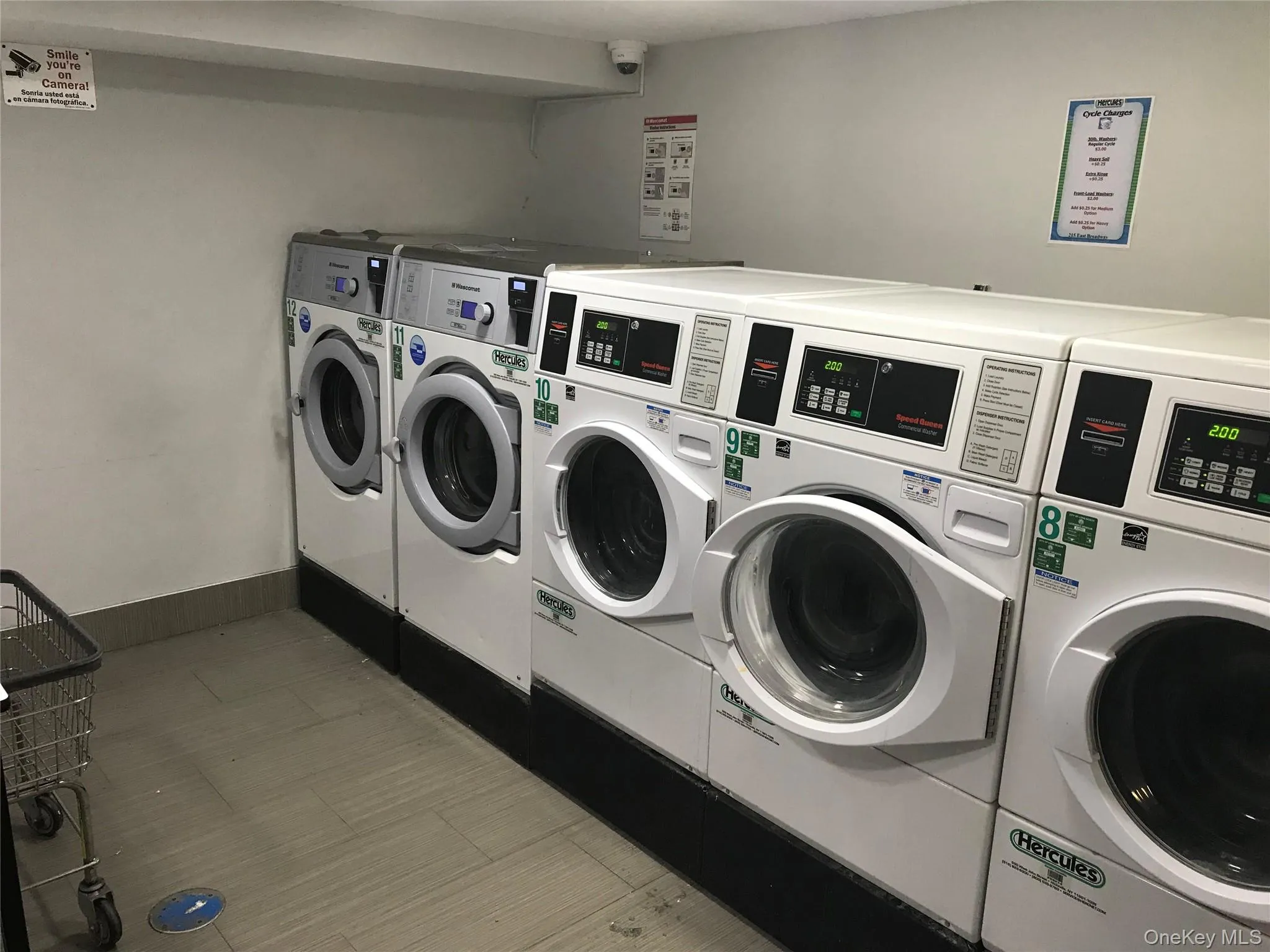 Community laundry featuring washer and clothes dryer Community laundry featuring washer and clothes dryer