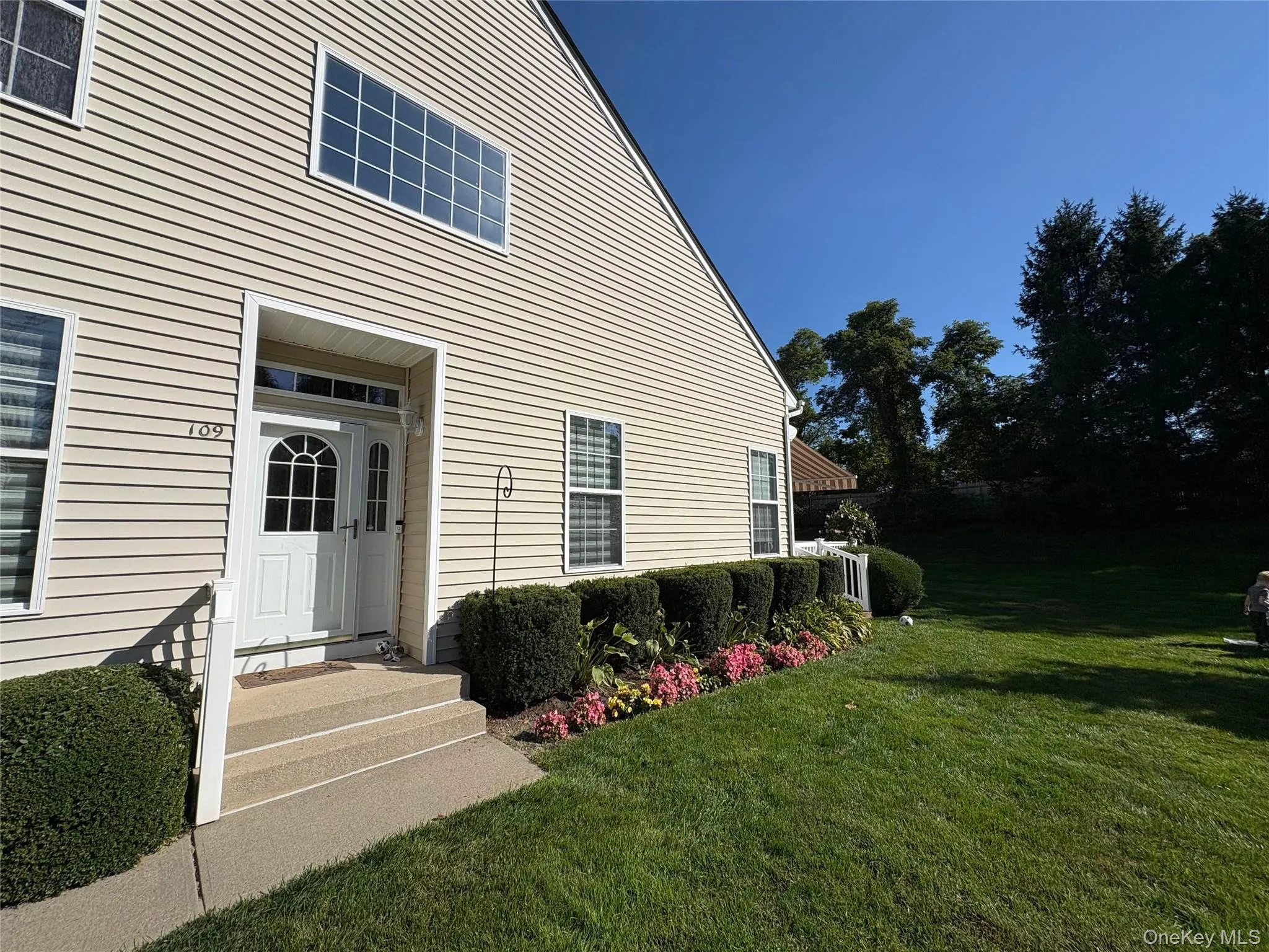 Doorway to property with a yard Doorway to property with a yard