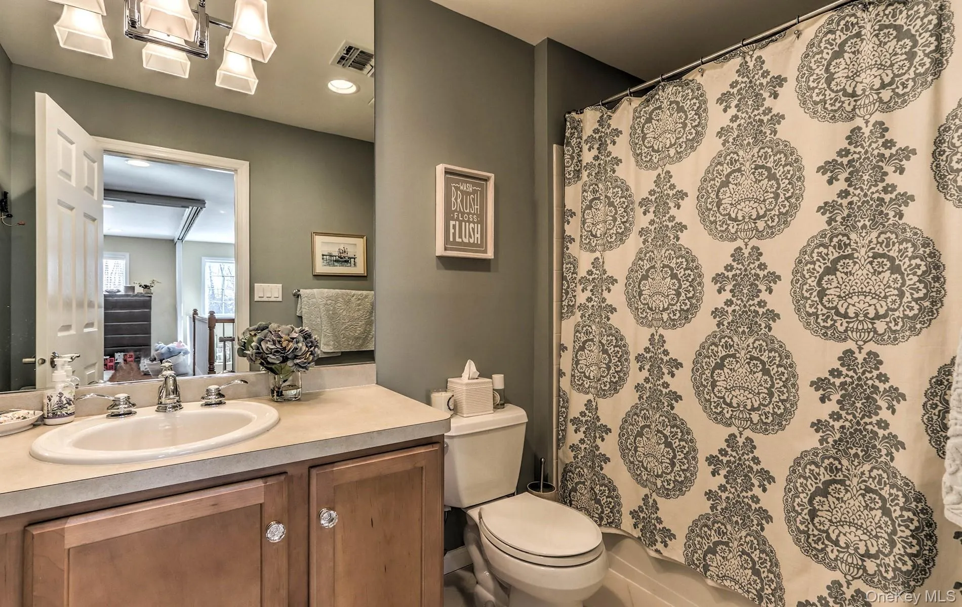 Ensuite bathroom with vanity and recessed lighting Ensuite bathroom with vanity and recessed lighting