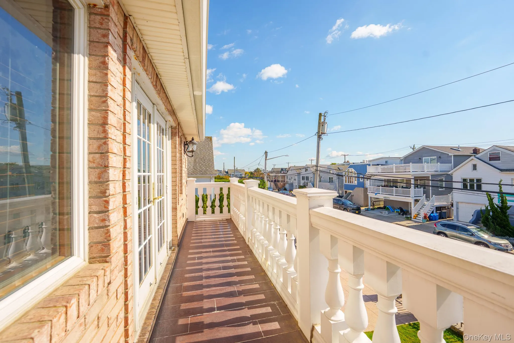 Balcony featuring a residential view Balcony featuring a residential view
