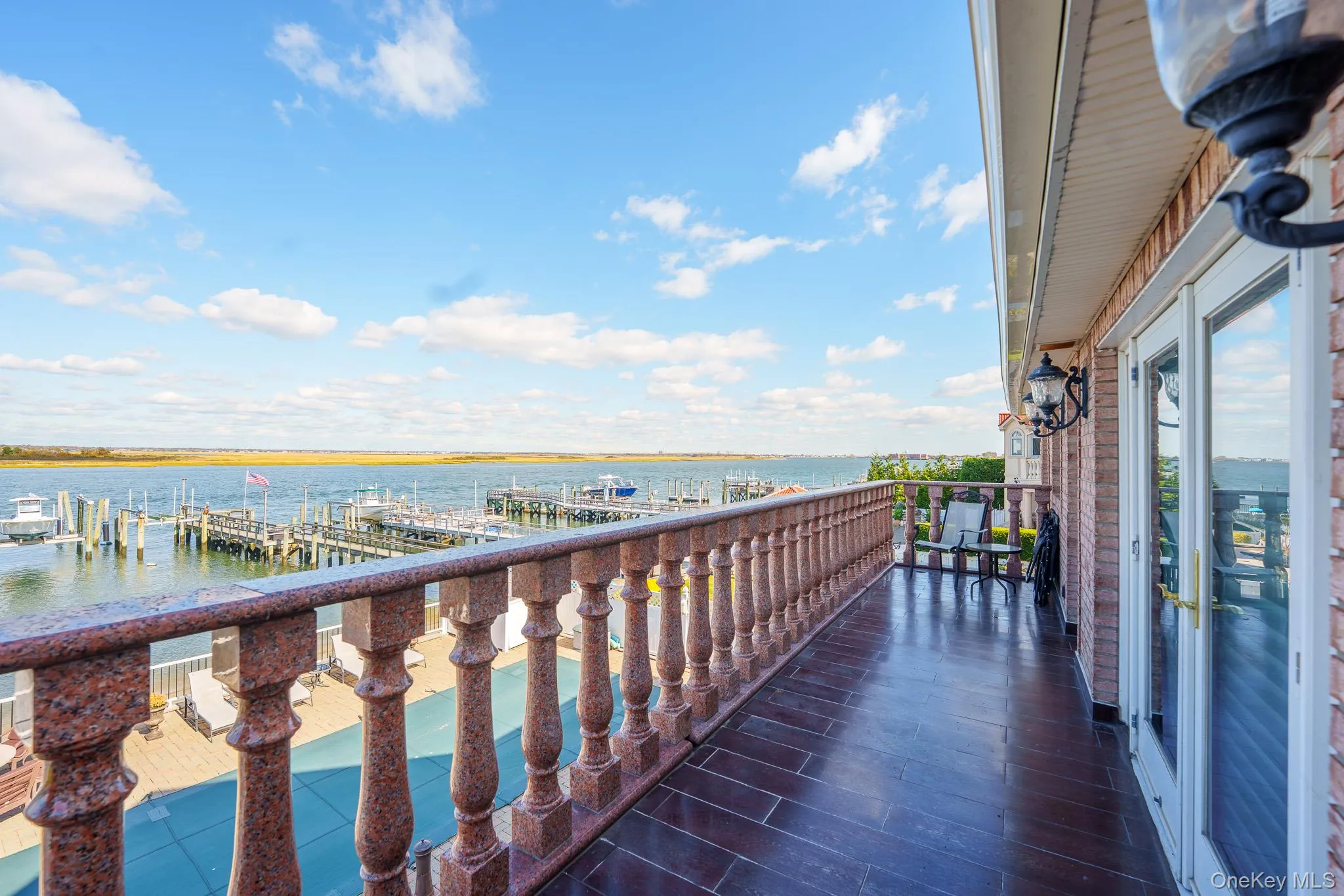 Balcony featuring a water view Balcony featuring a water view