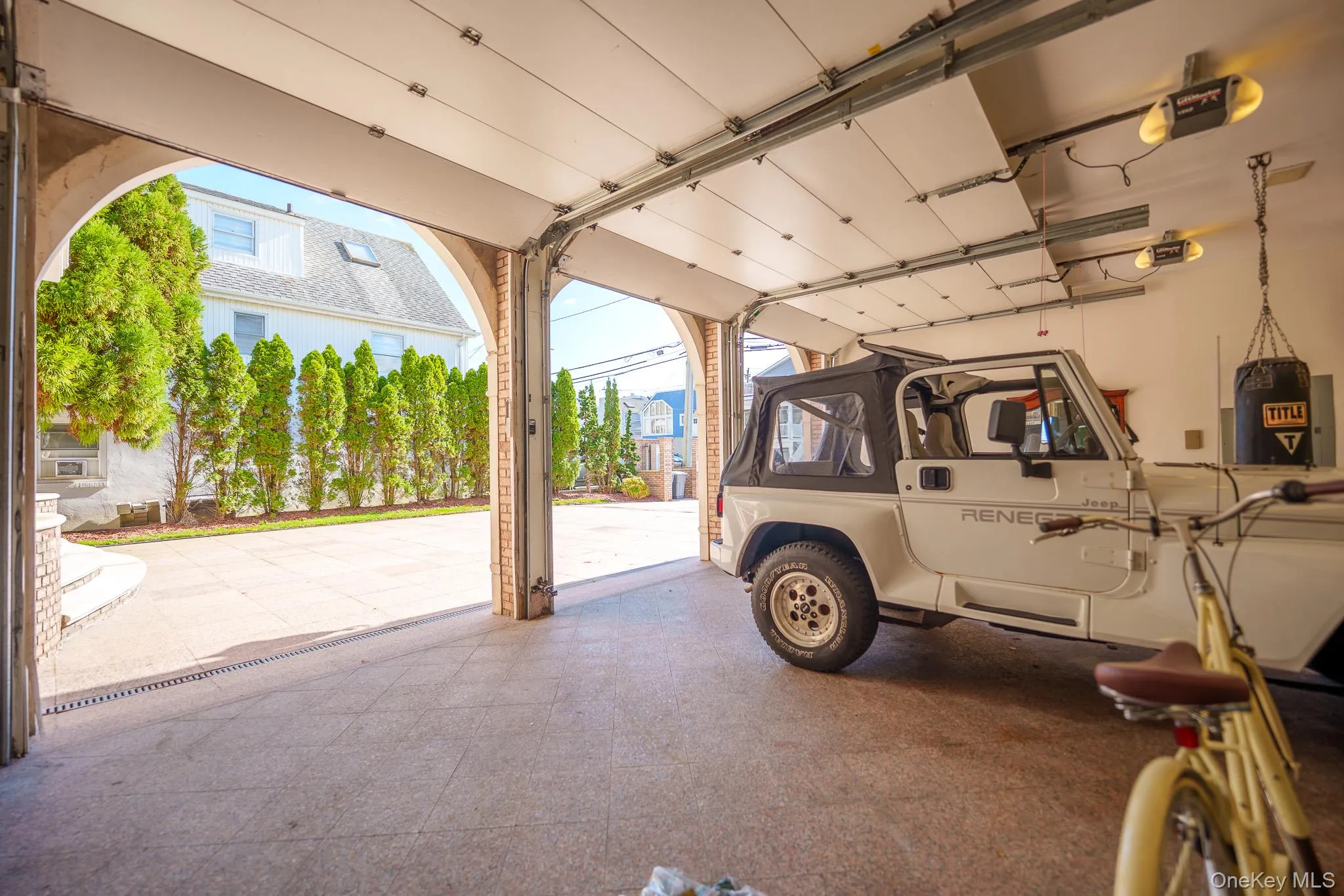 Garage featuring a garage door opener Garage featuring a garage door opener