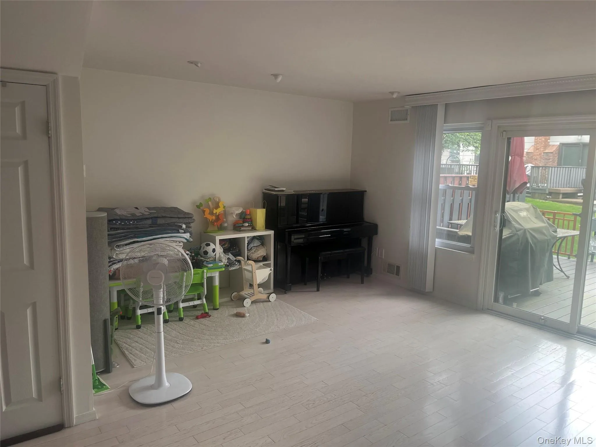 Living area featuring light wood-style flooring Living area featuring light wood-style flooring