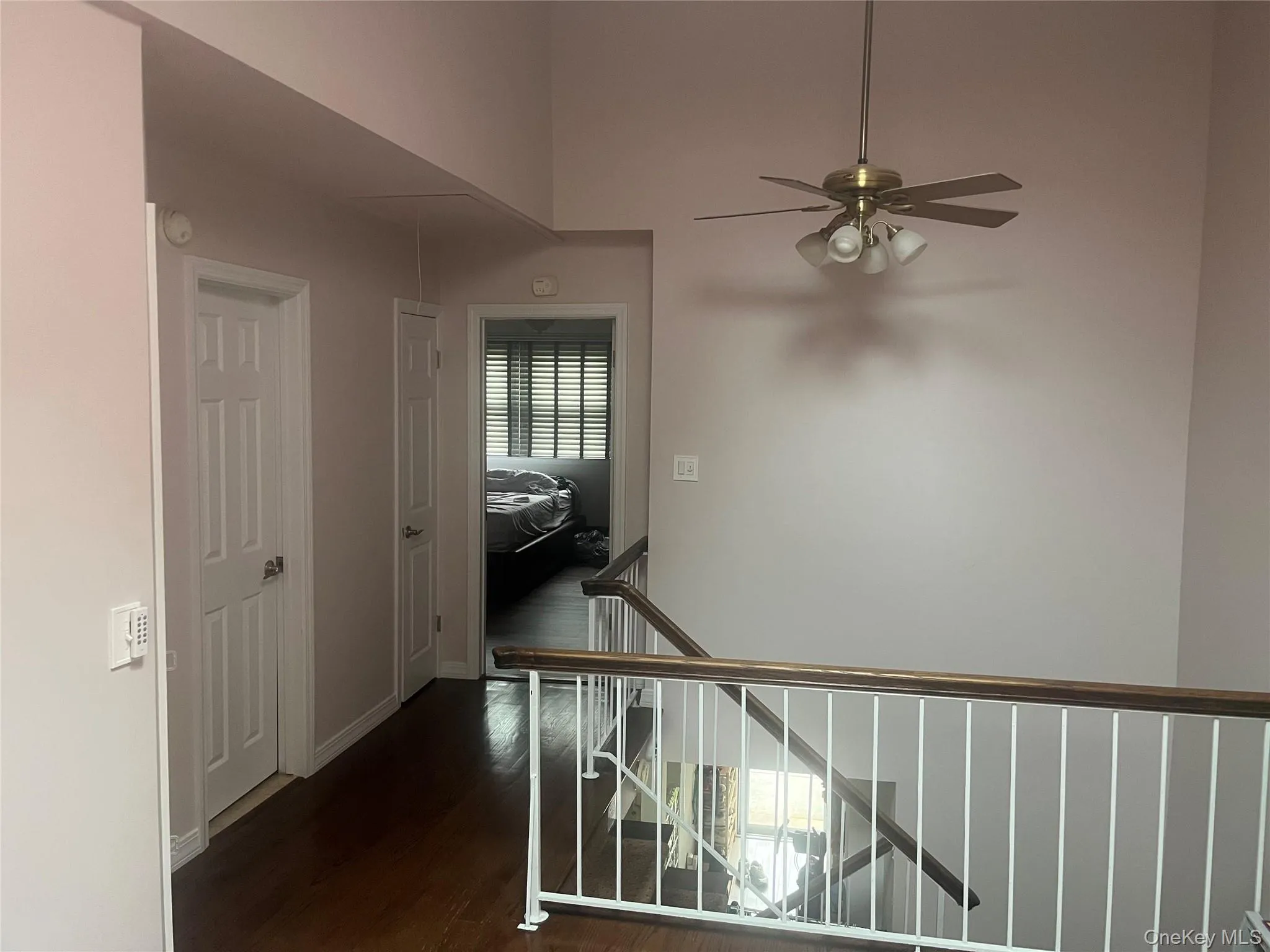 Stairway with wood finished floors and baseboards Stairway with wood finished floors and baseboards