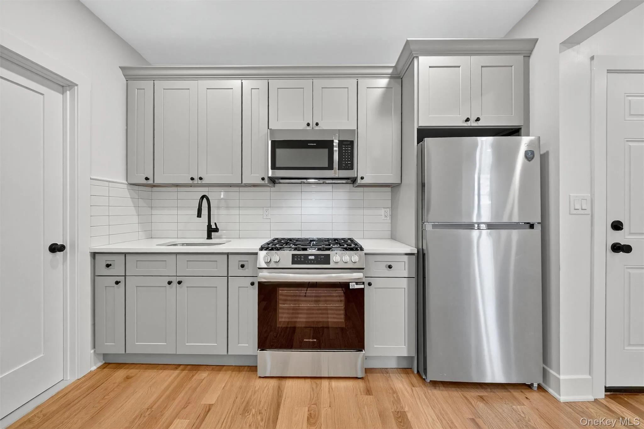 Kitchen with stainless steel appliances Kitchen with stainless steel appliances