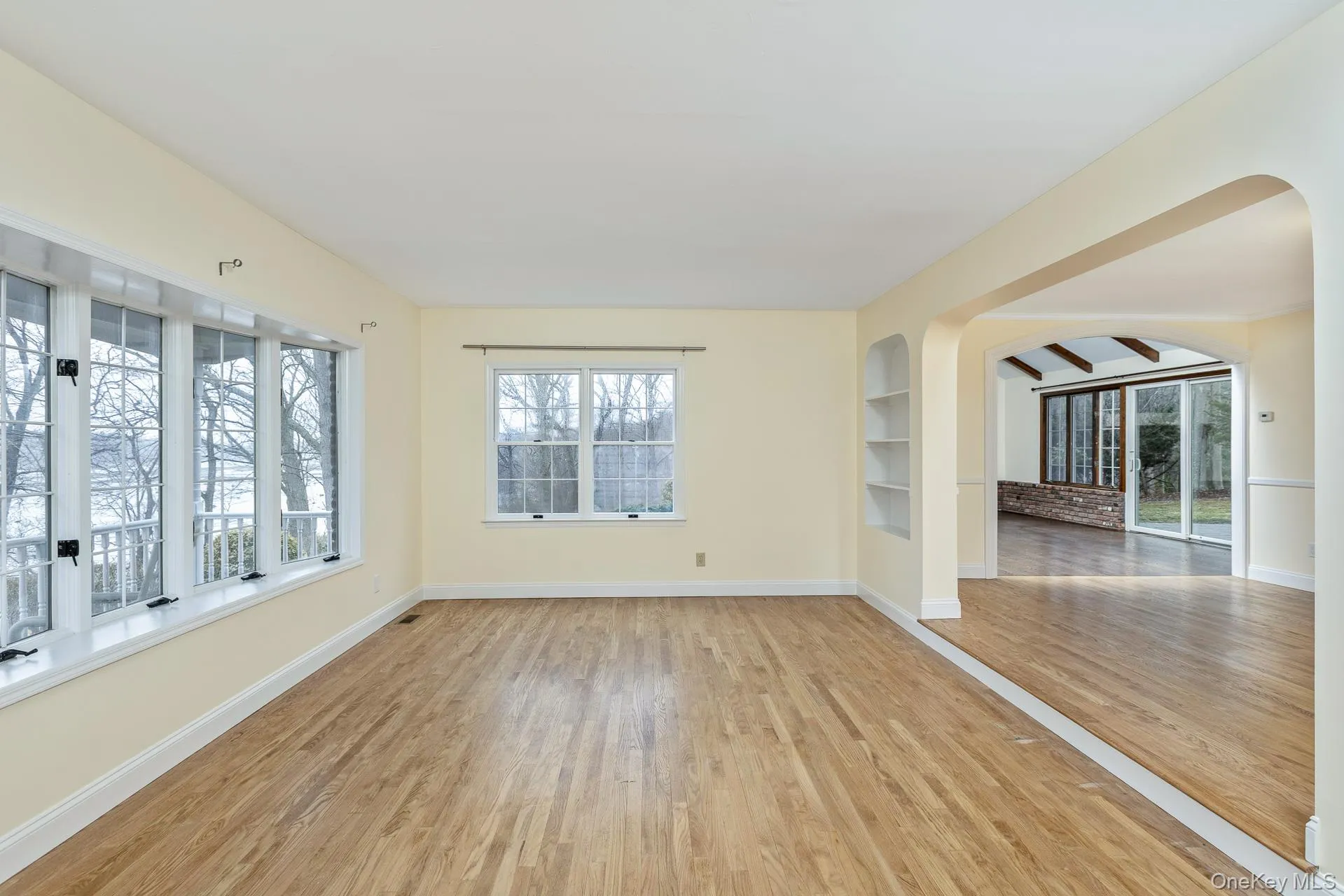 Formal Living Room- Built In Shelving, Wood Floors Formal Living Room- Built In Shelving, Wood Floors