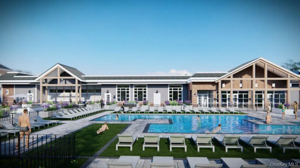 Back of property with a patio area and a community pool Back of property with a patio area and a community pool
