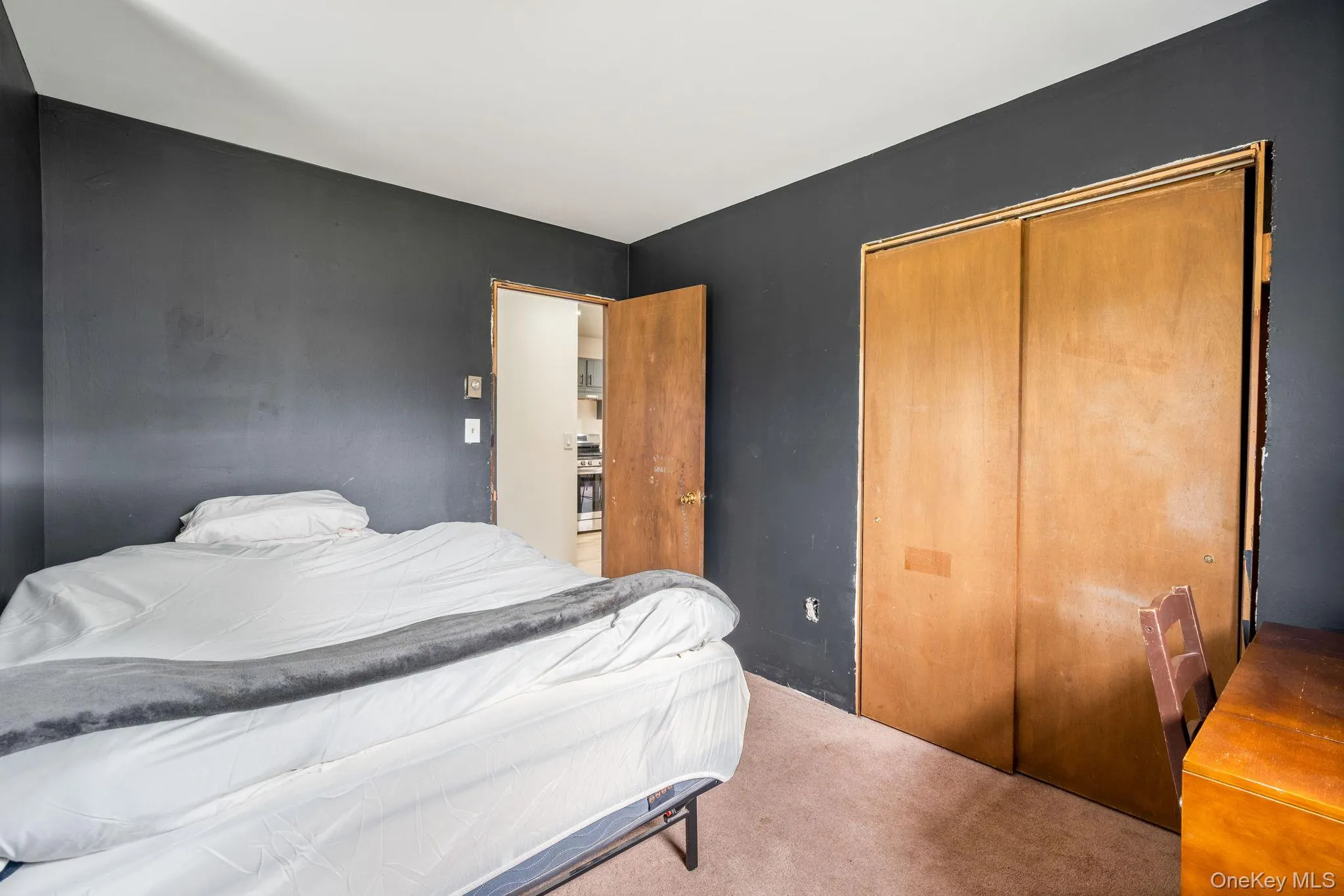 Bedroom with carpet floors and a closet Bedroom with carpet floors and a closet