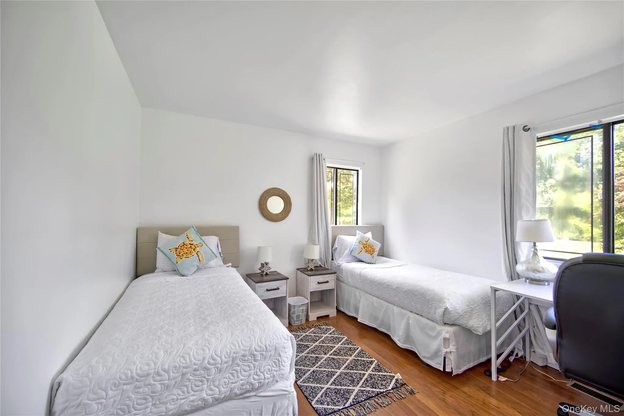 Bedroom featuring wood finished floors Bedroom featuring wood finished floors