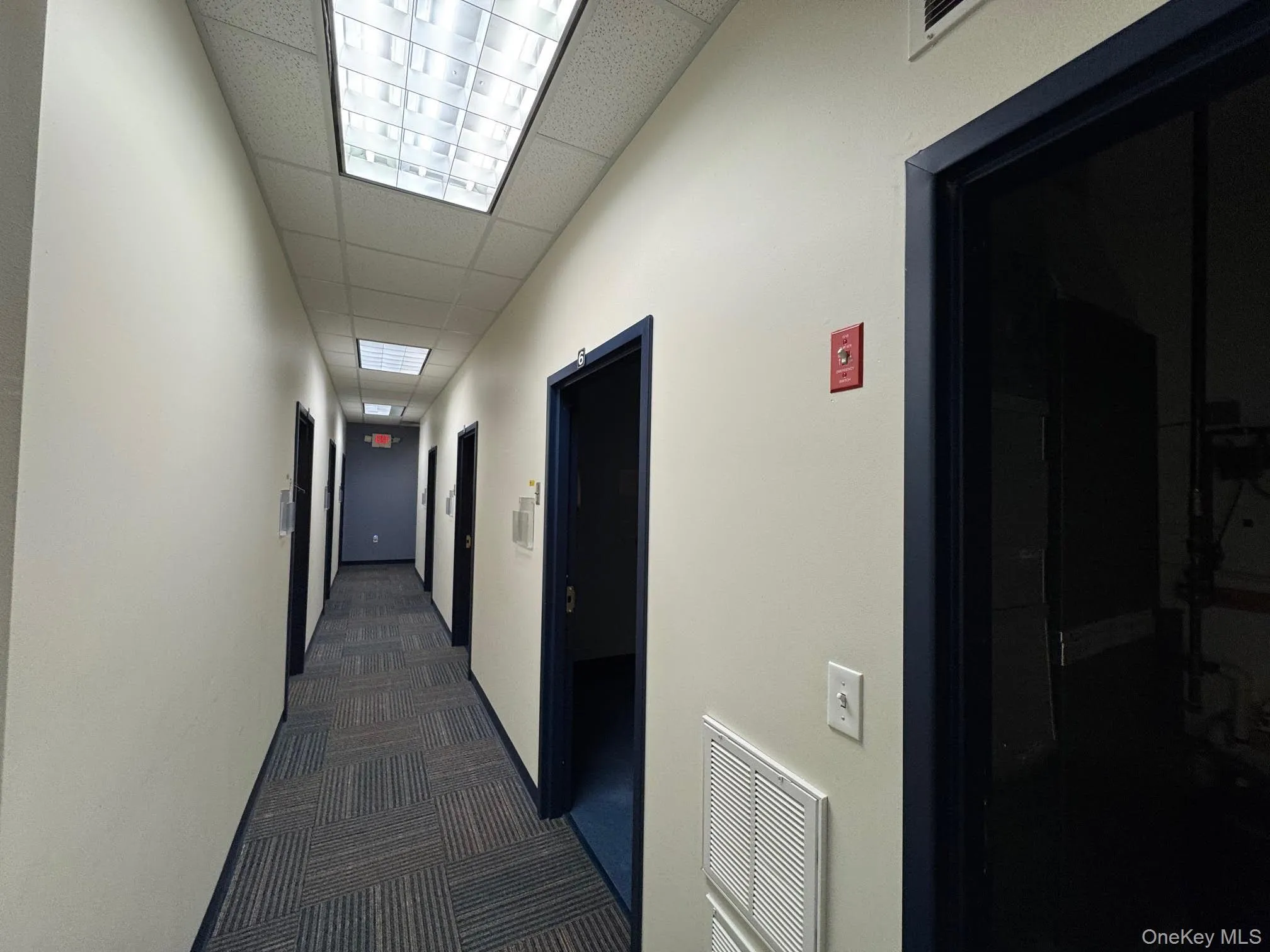 Corridor with dark carpet Corridor with dark carpet