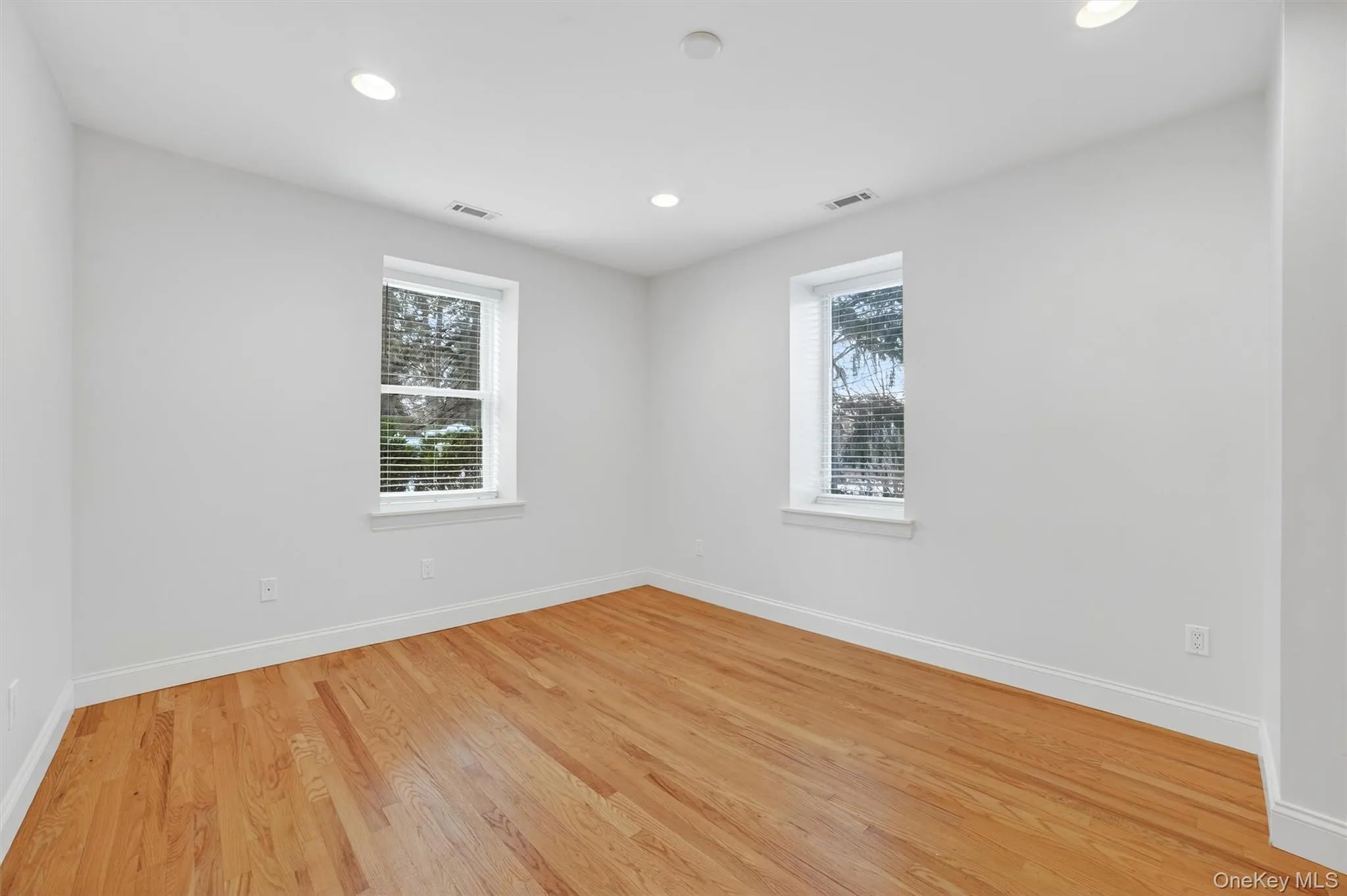 Large second bedroom with generous closets. Large second bedroom with generous closets.