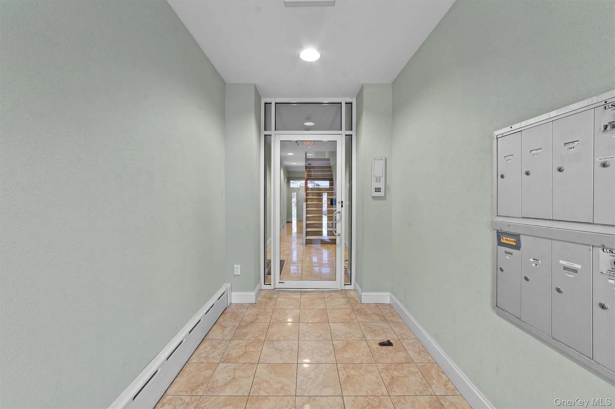 Front lobby with secure access to the building and mail area. Front lobby with secure access to the building and mail area.