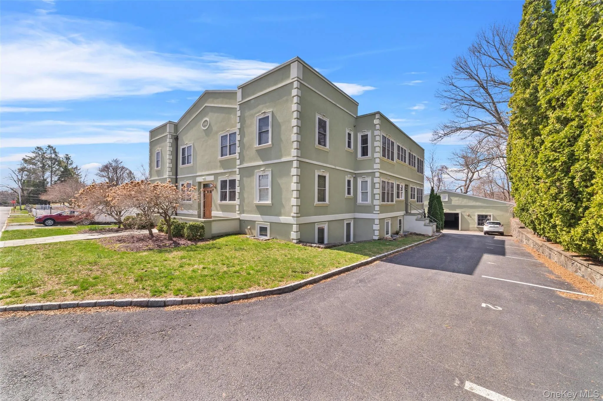 Right side of the building leads to covered garage. 1 covered space along with 1 outdoor assigned space. Right side of the building leads to covered garage. 1 covered space along with 1 outdoor assigned space.