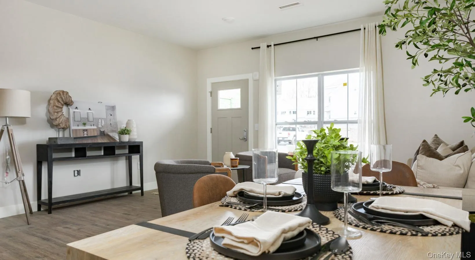 Dining room featuring wood finished floors and baseboards Dining room featuring wood finished floors and baseboards