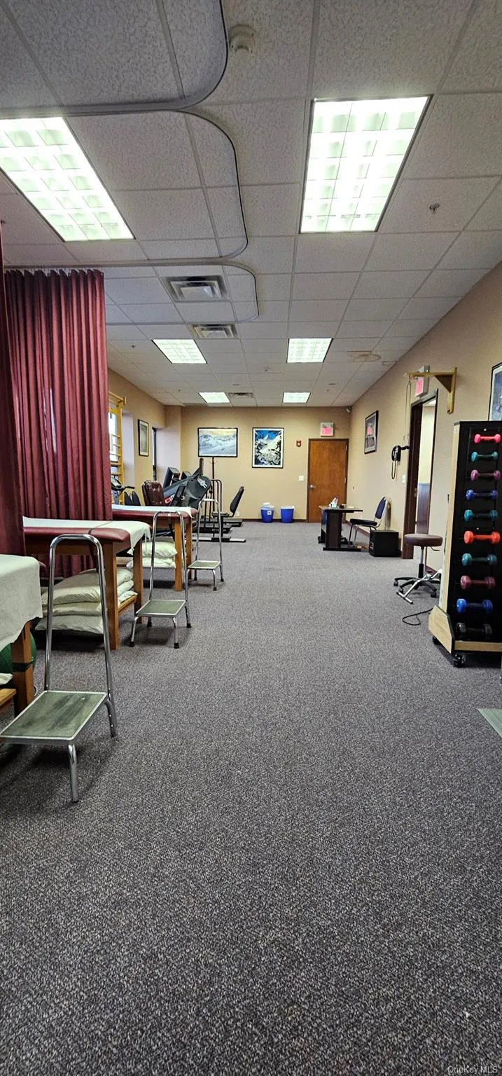 Miscellaneous room with a paneled ceiling Miscellaneous room with a paneled ceiling
