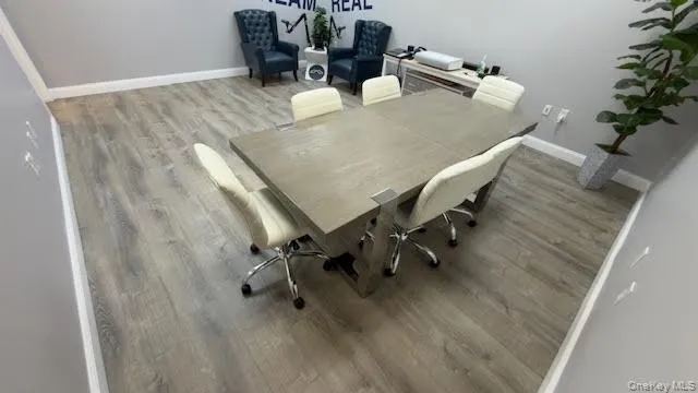 Office featuring light wood-style floors and baseboards Office featuring light wood-style floors and baseboards