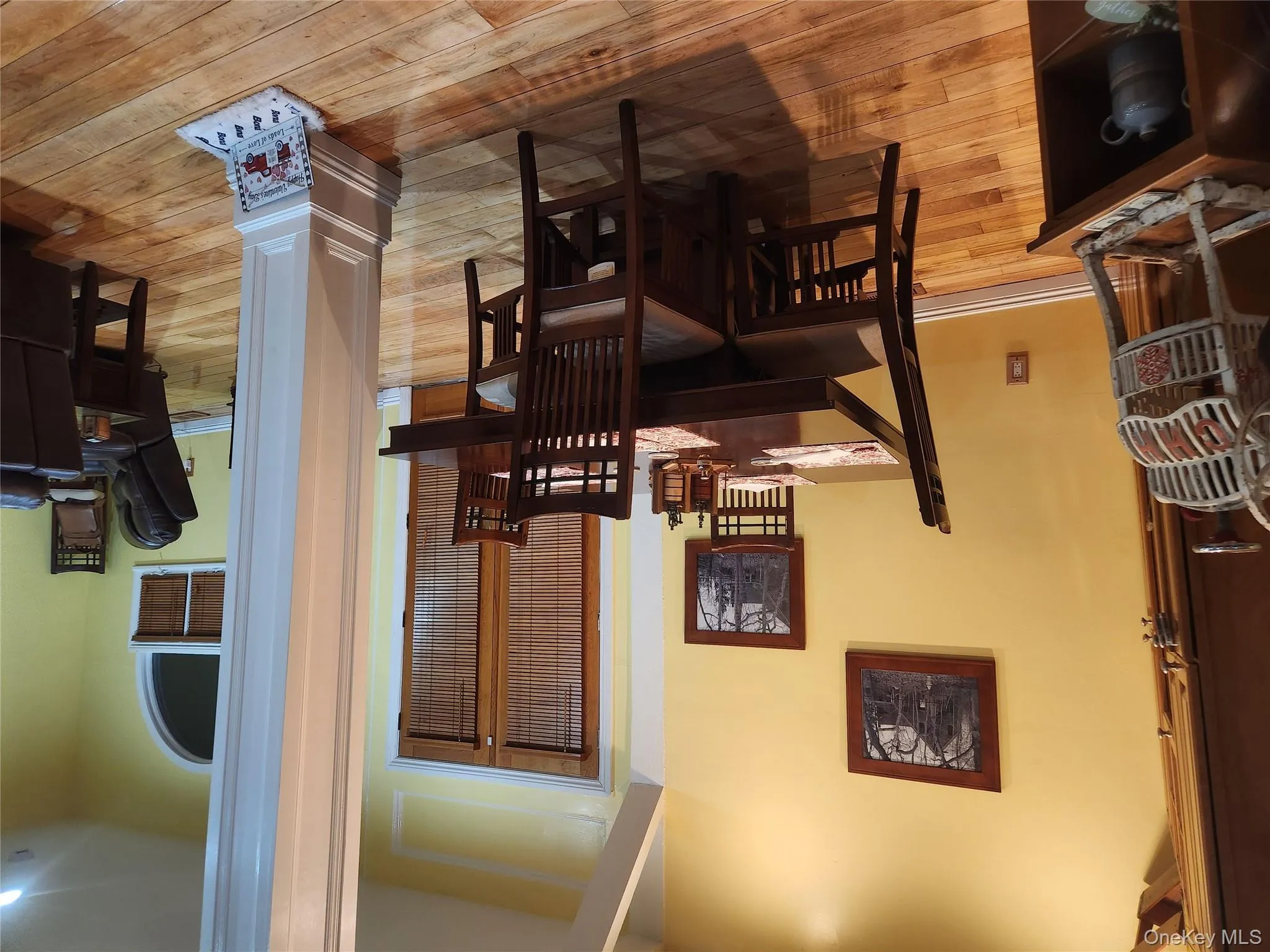 Dining area with light wood-type flooring Dining area with light wood-type flooring