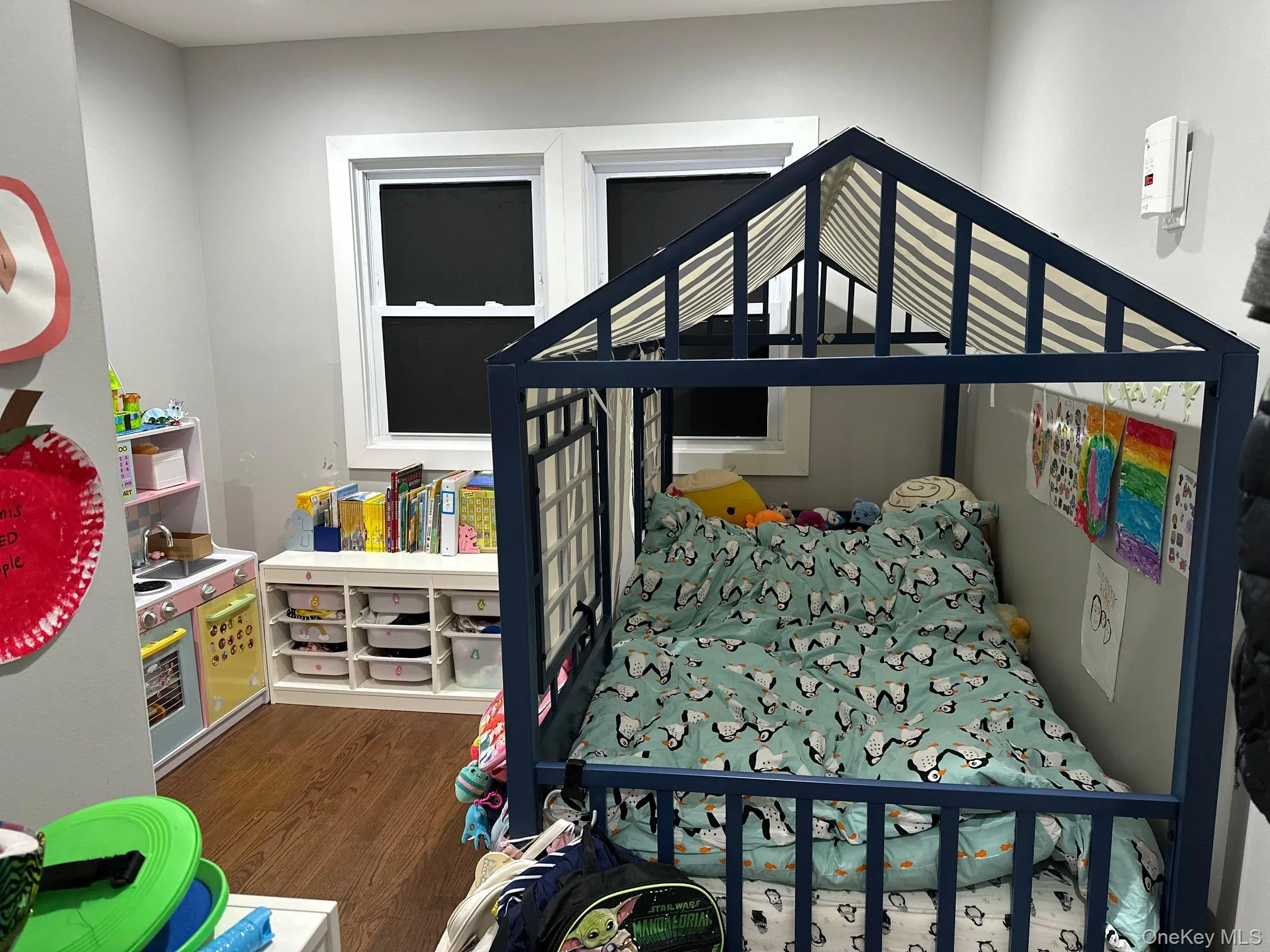 Bedroom with dark wood-type flooring Bedroom with dark wood-type flooring