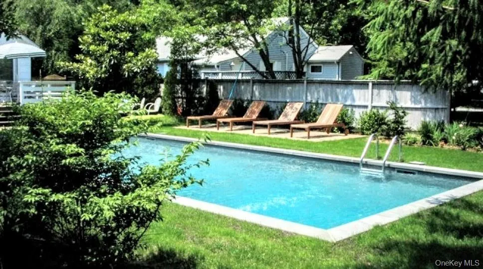 View of pool with a patio View of pool with a patio