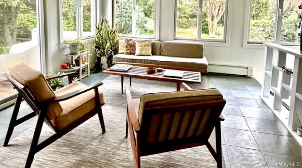 Sunroom / solarium with baseboard heating Sunroom / solarium with baseboard heating
