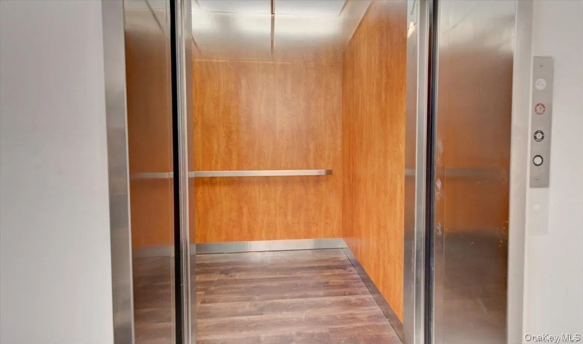 Detailed view of wood finished floors and elevator Detailed view of wood finished floors and elevator