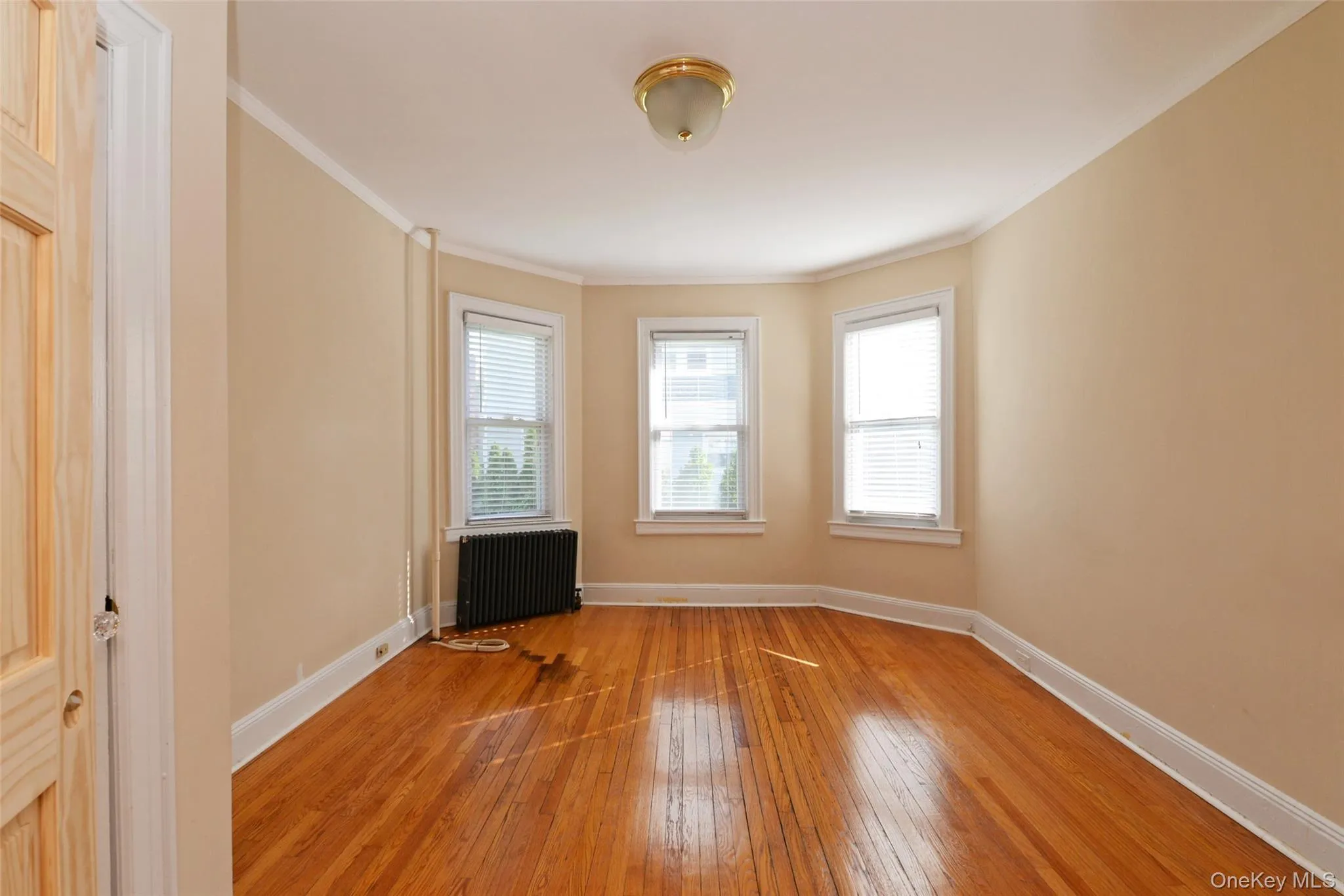 featuring hardwood flooring featuring hardwood flooring