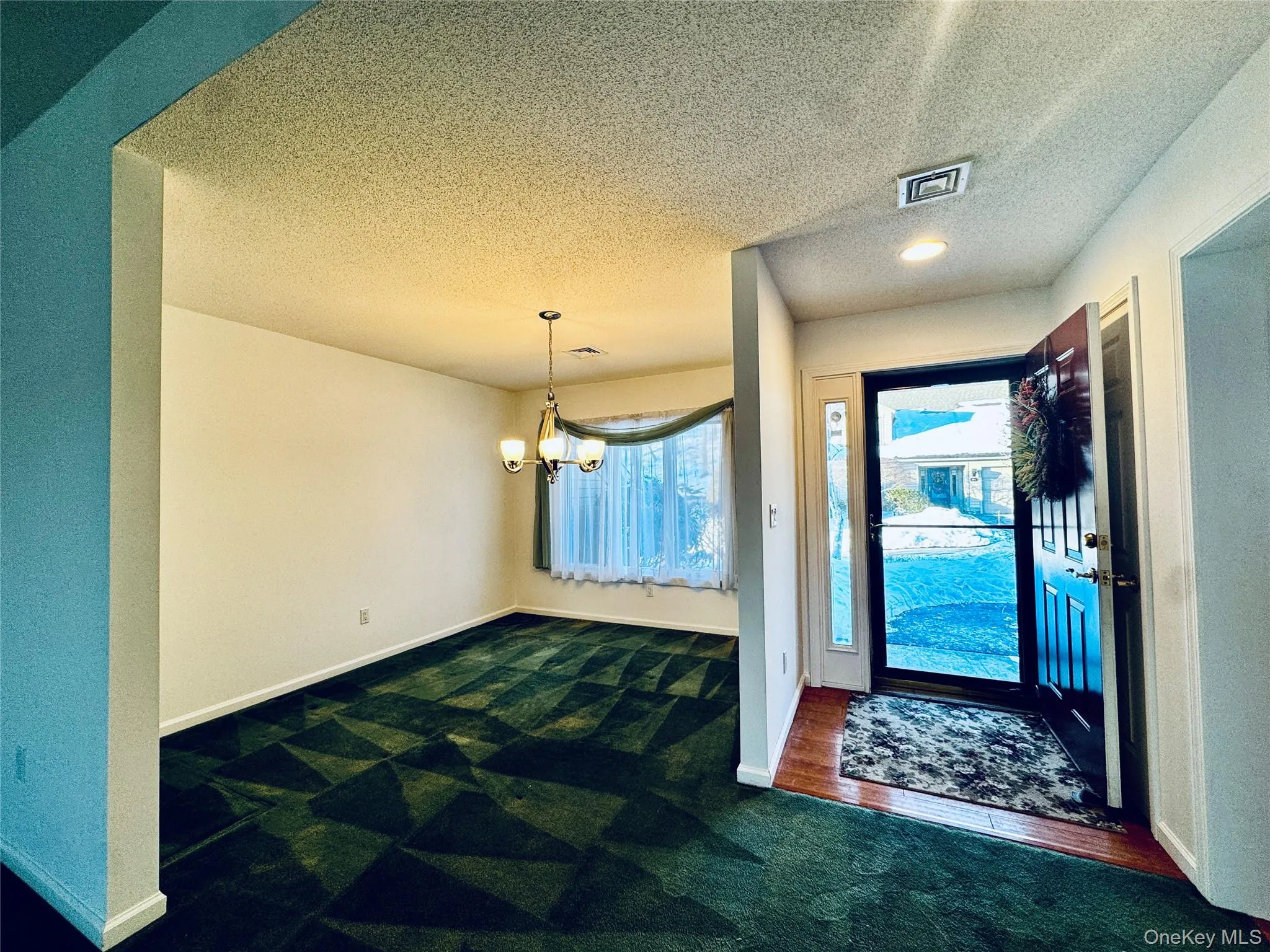 Entry way has a Wood Floor Foyer Entry way has a Wood Floor Foyer
