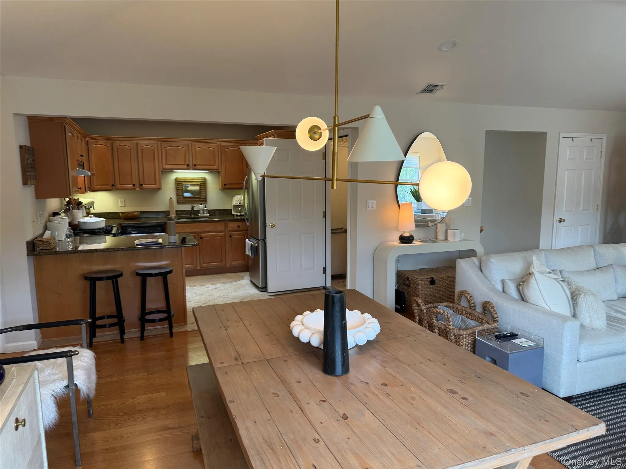 Dining space featuring light wood-type flooring Dining space featuring light wood-type flooring