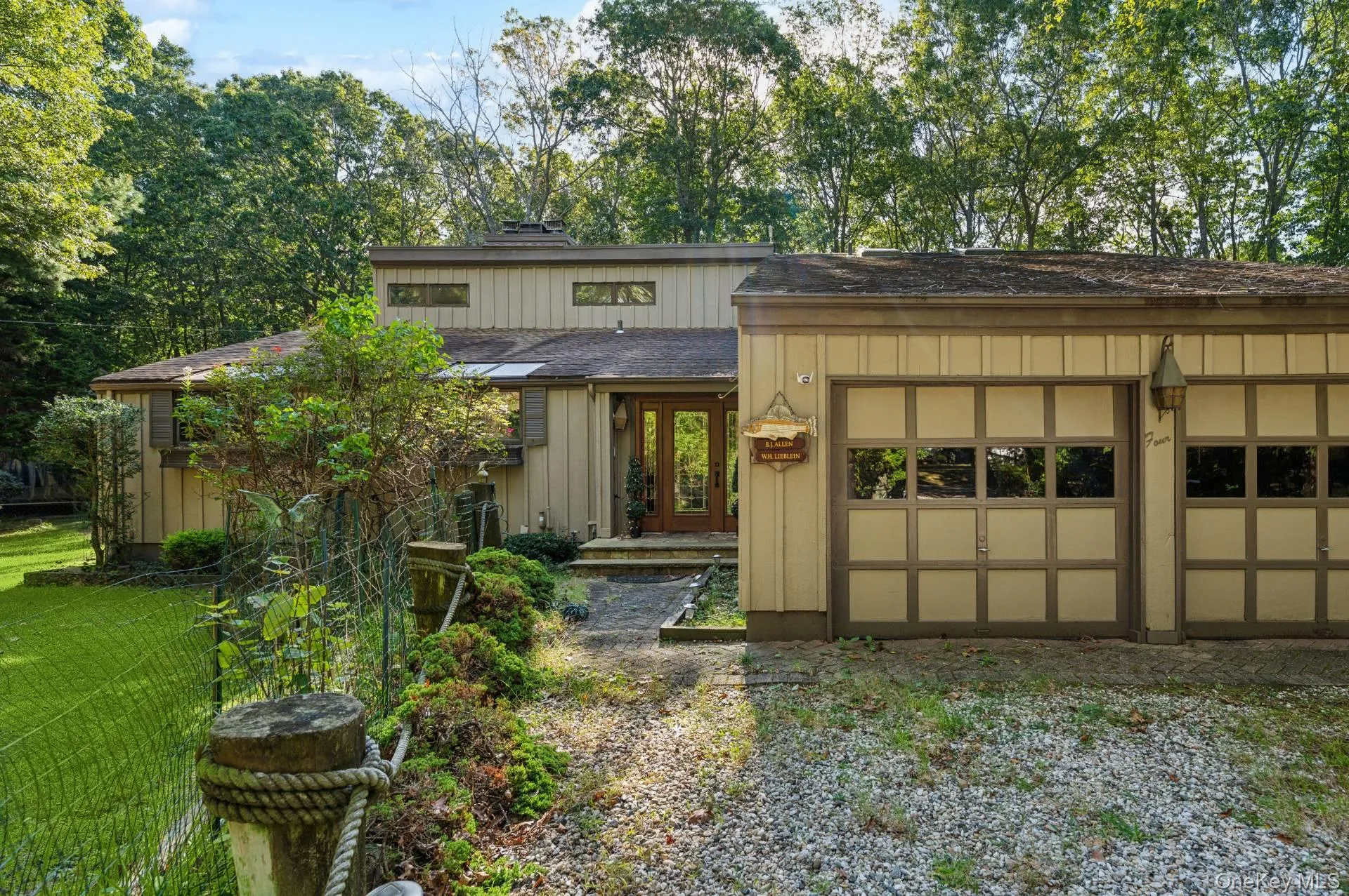 Front of house with attached 2-car garage Front of house with attached 2-car garage