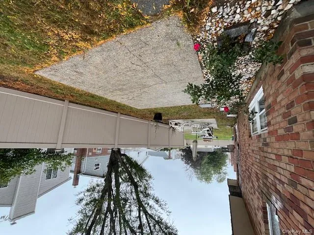 Fenced backyard featuring a patio area Fenced backyard featuring a patio area