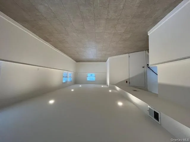 Below grade area with recessed lighting and baseboards Below grade area with recessed lighting and baseboards