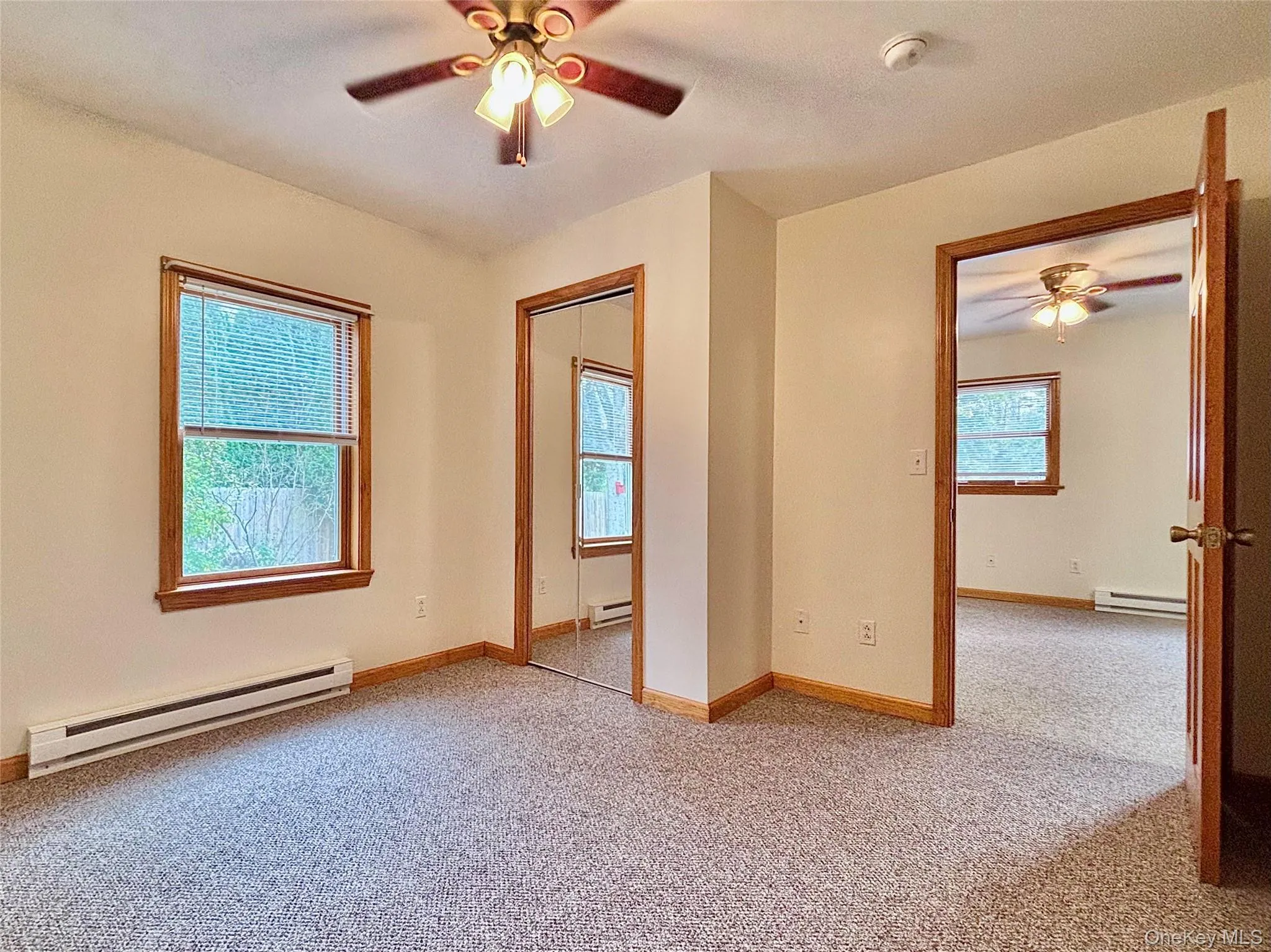 Mirrored closet doors, ceiling fan/light Mirrored closet doors, ceiling fan/light