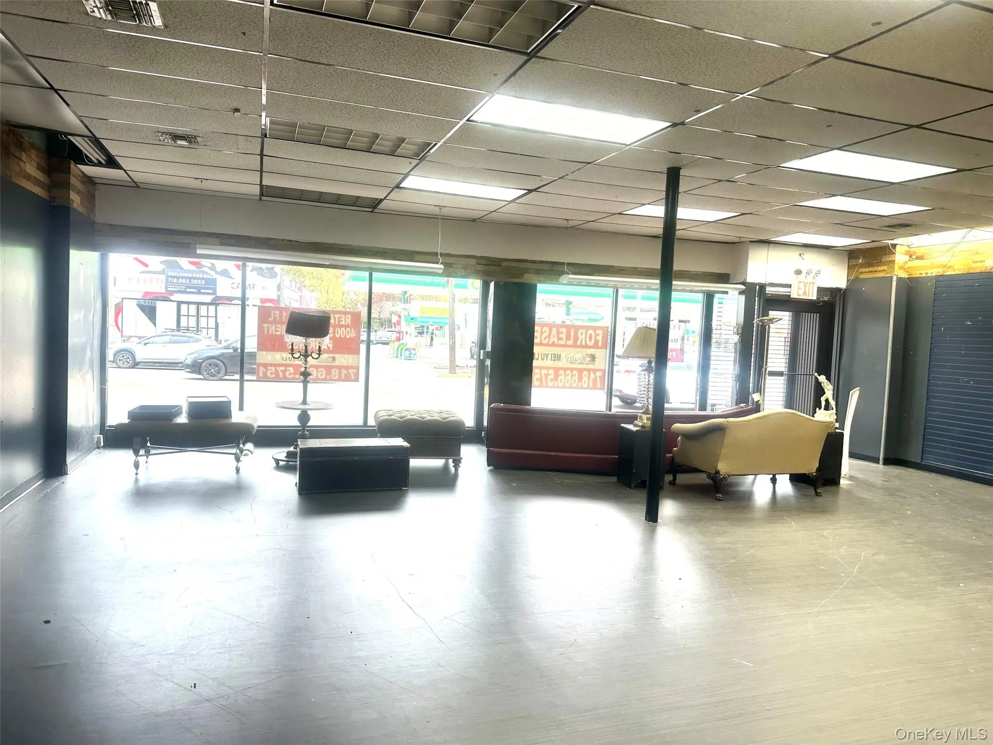 Building lobby featuring a drop ceiling Building lobby featuring a drop ceiling