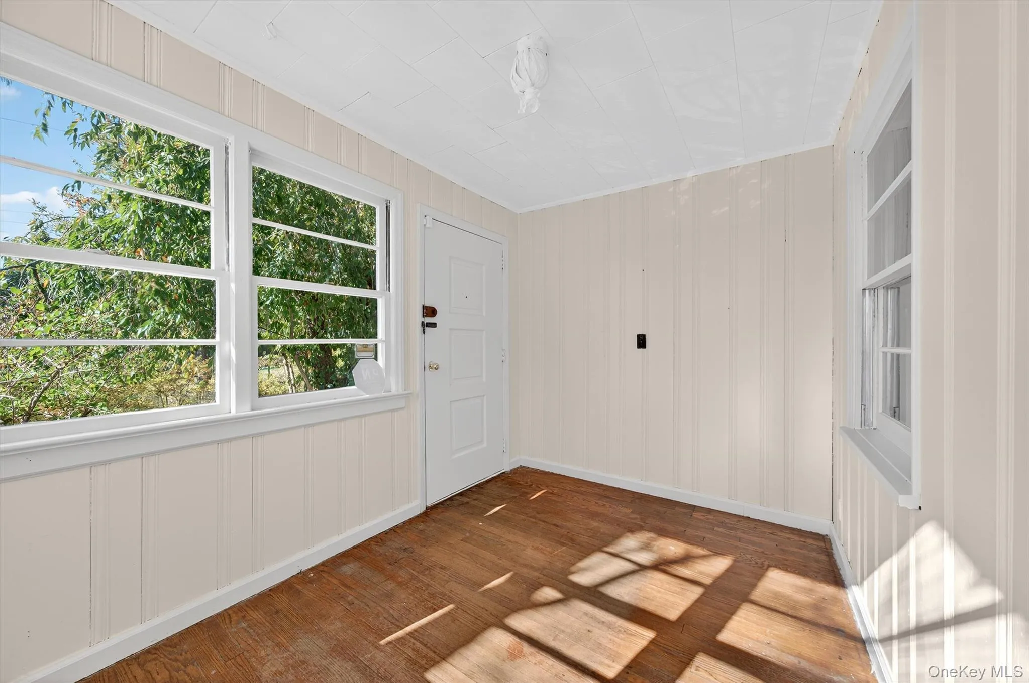 View of unfurnished sunroom View of unfurnished sunroom