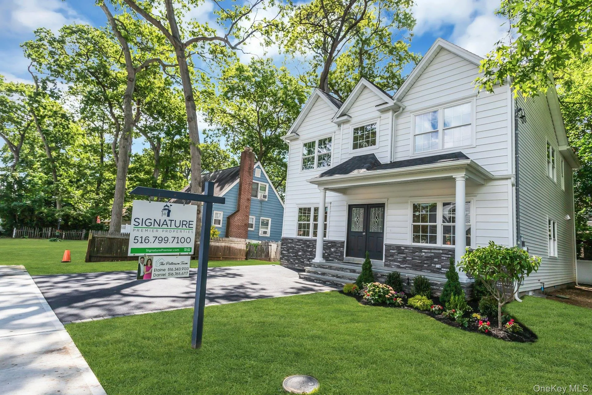 Contemporary Colonial-style featuring, beautiful landscape, 2 car driveway Contemporary Colonial-style featuring, beautiful landscape, 2 car driveway