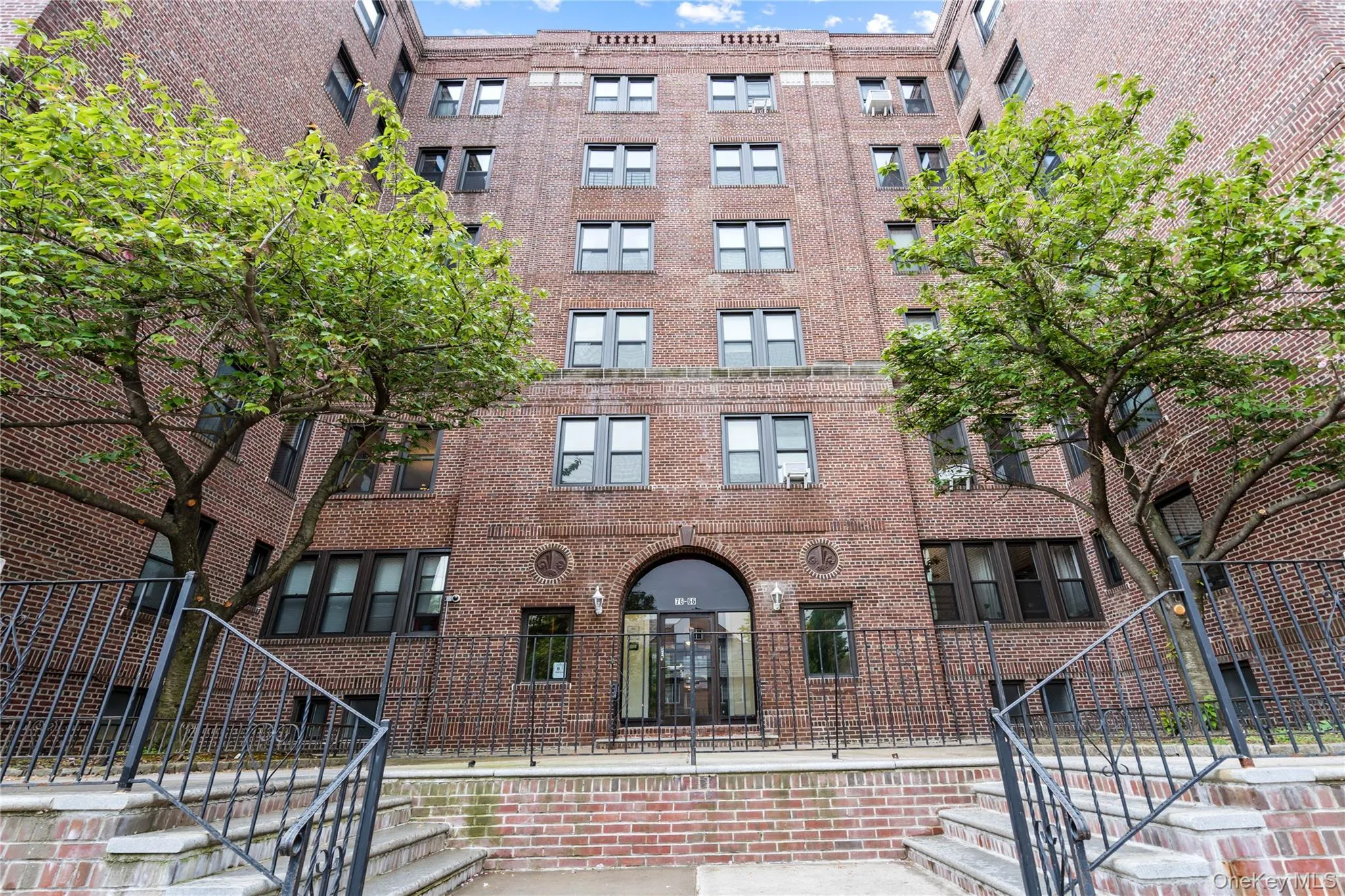 View of apartment building / complex featuring stairway View of apartment building / complex featuring stairway