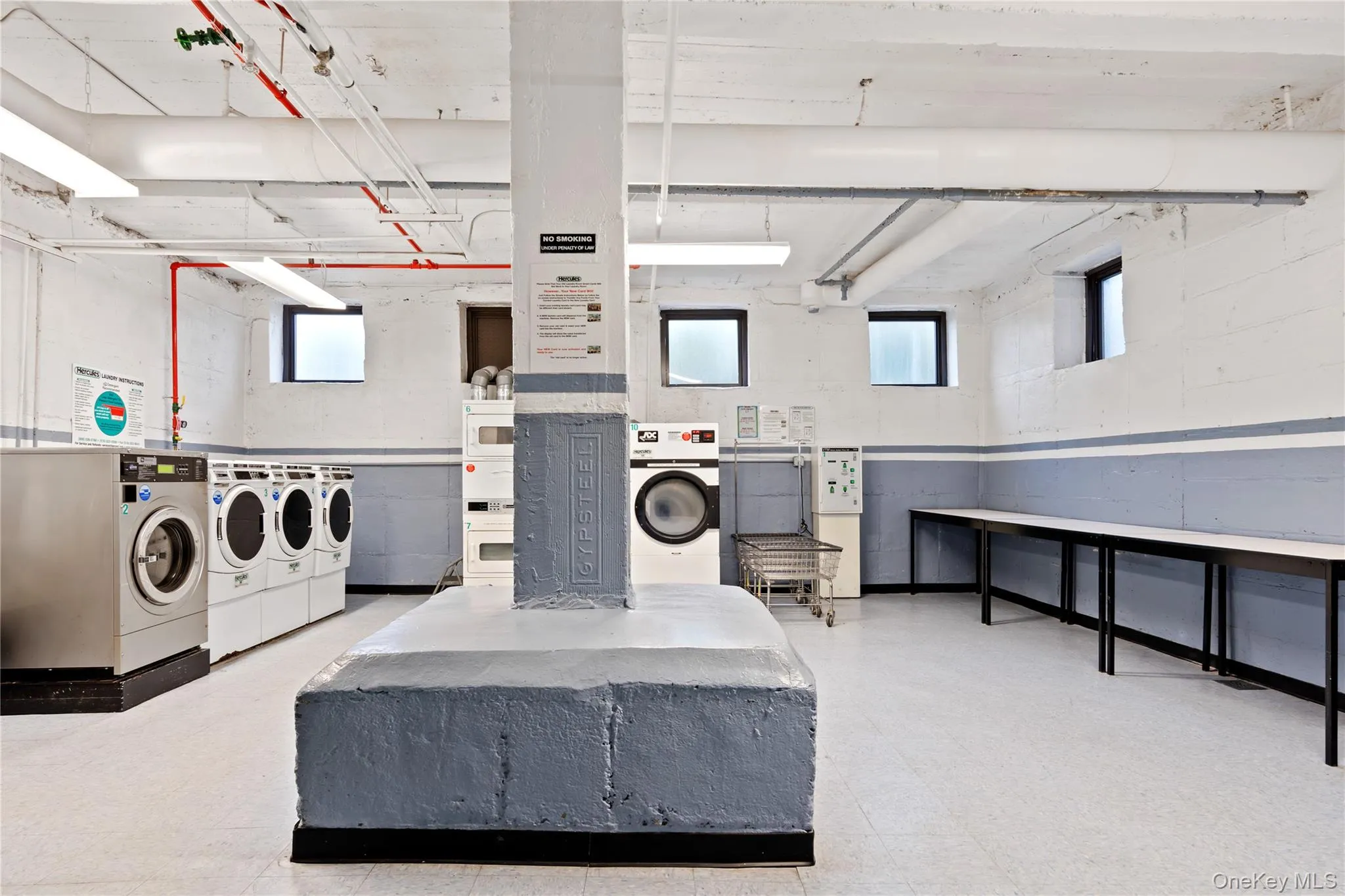 Community laundry featuring washer and dryer Community laundry featuring washer and dryer
