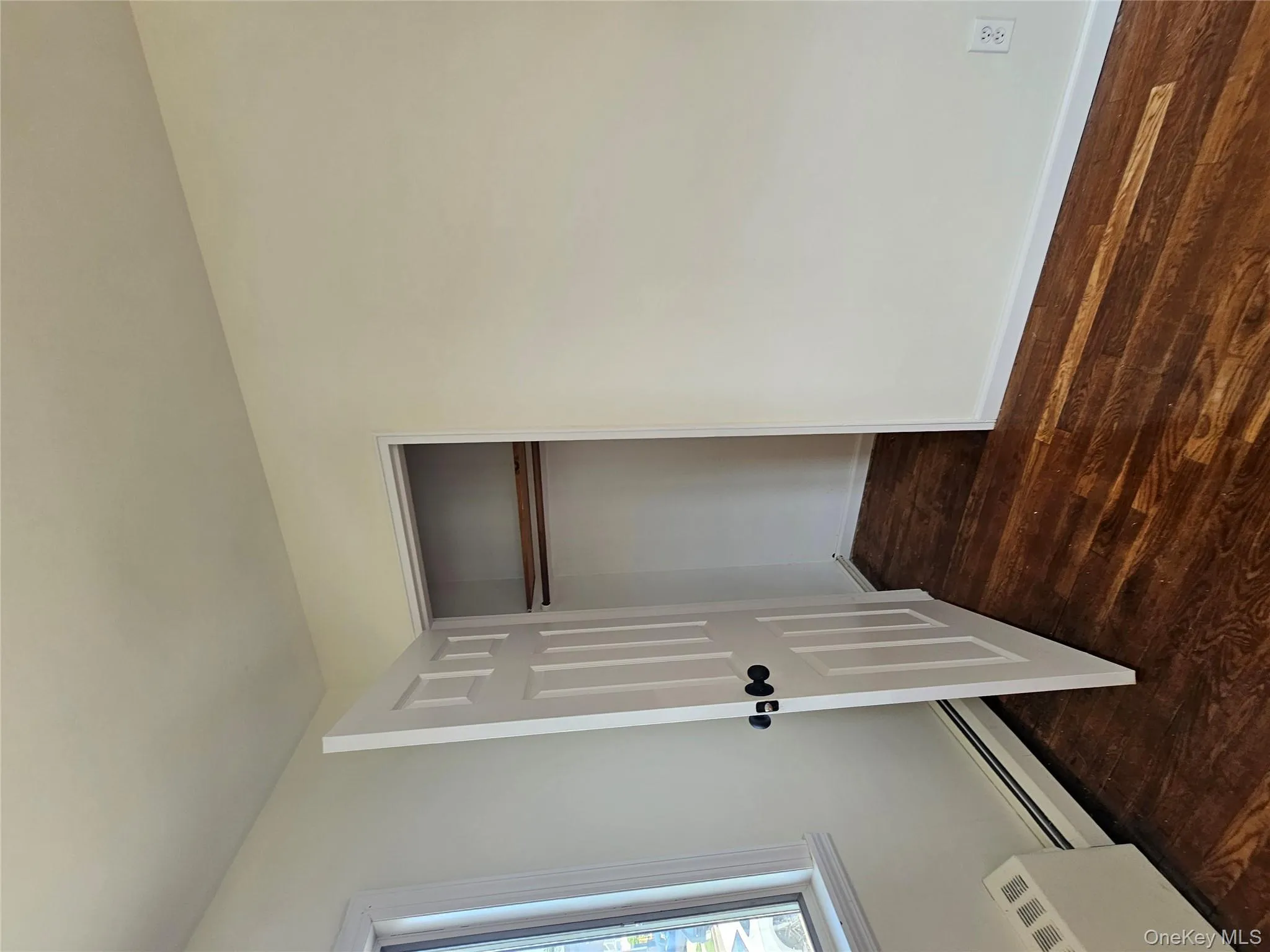 Closet featuring baseboard heating Closet featuring baseboard heating