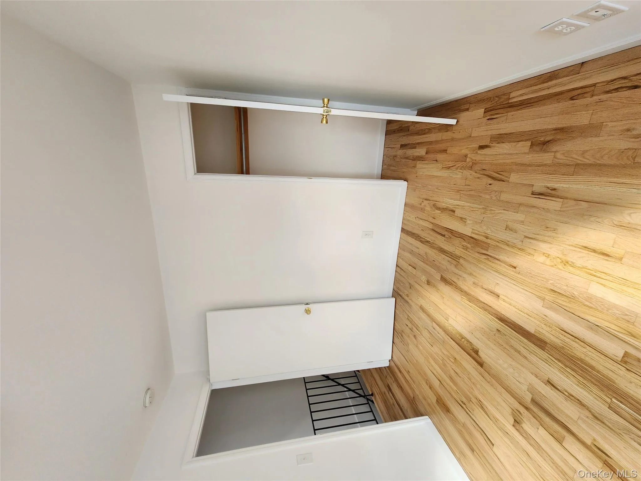 Unfurnished bedroom featuring light wood-style floors and baseboards Unfurnished bedroom featuring light wood-style floors and baseboards
