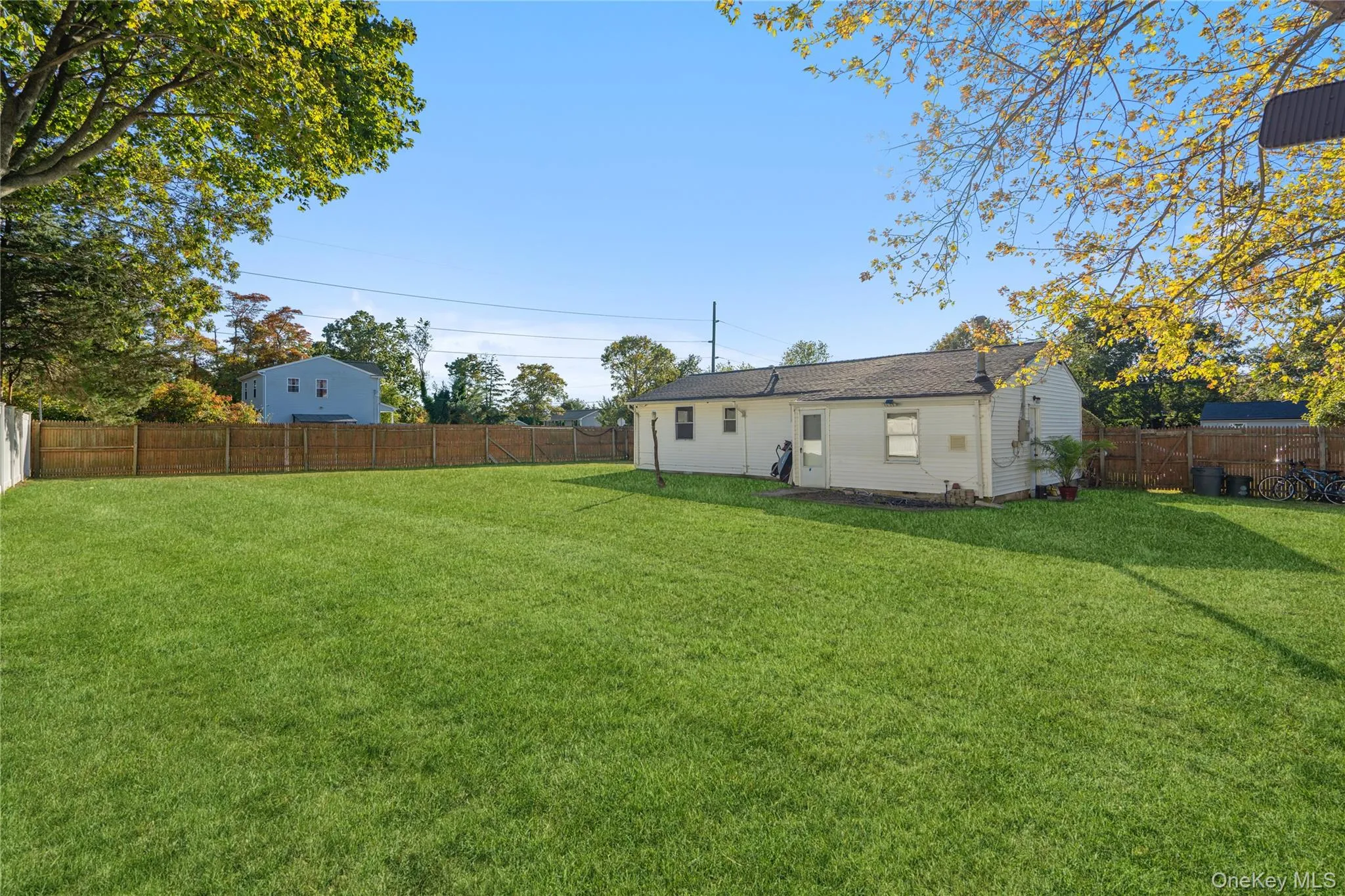 Back of property with a fenced backyard Back of property with a fenced backyard